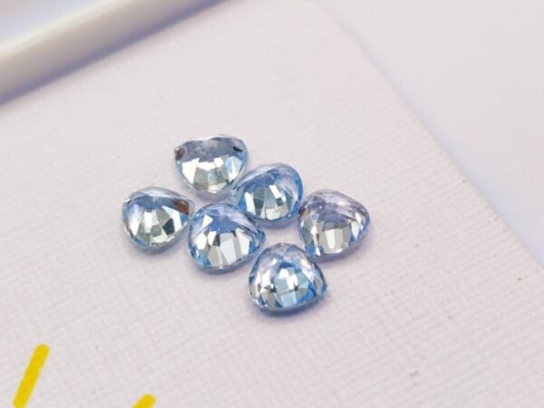 lot 6 saphirs light blue pear cut 3.27 carats back of the stone