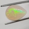 opale noble play of colors cabochon cut 5.57 carats