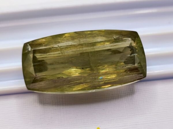 diaspore zultanite yellowish green pinkish brown cushion cut 55.18 carats