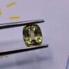 diaspore zultanite yellowish green to pinkish brown cushion cut 2.11 carats