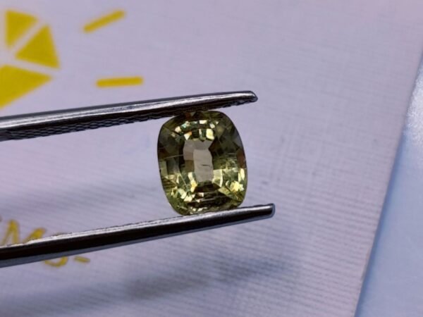 diaspore zultanite yellowish green to pinkish brown cushion cut 2.11 carats