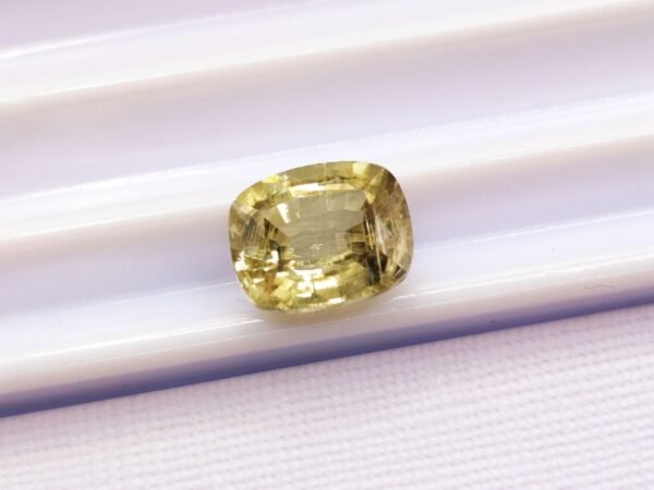 diaspore zultanite yellowish green to pinkish brown cushion cut 2.11 carats