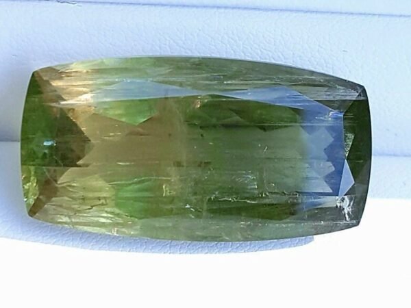 diaspore zultanite yellowish green pinkish brown cushion cut 55.18 carats