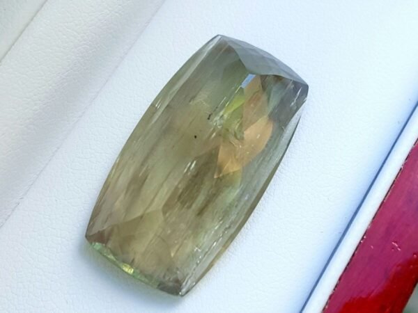 diaspore zultanite yellowish green pinkish brown cushion cut 55.18 carats