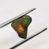 opale noble play of colors unshape cabochon cut 2.44 carats