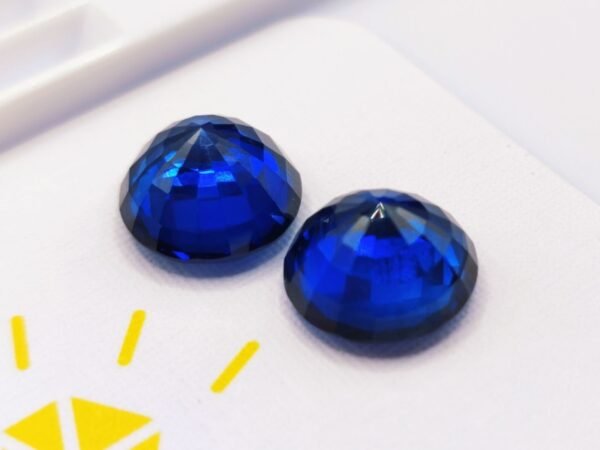 two blue round cut lab saphir 17.18 carats