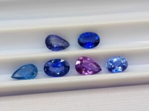 Stone lot 6 saphirs blue pink oval and pear cut 2.55 carats back of stones