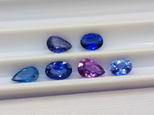 Stone lot 6 saphirs blue pink oval and pear cut 2.55 carats back of stones