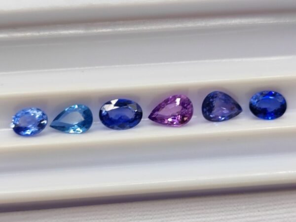 Stone lot 6 saphirs blue pink oval and pear cut 2.55 carats back of stones