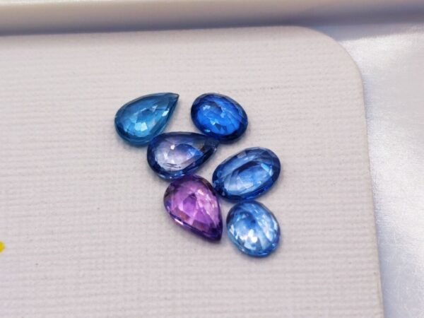 Stone lot 6 saphirs blue pink oval and pear cut 2.55 carats back of stones
