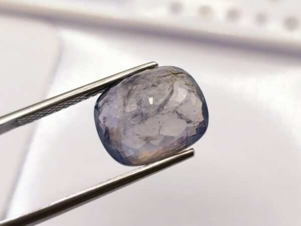 Iolite bluish violet cushion cut 7.04 caratsback of the stone