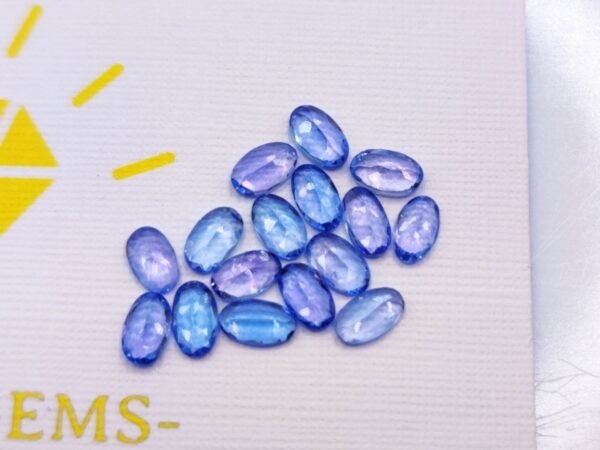 stone lot 16 blue tanzanites oval cut 3.45 carats back of stones