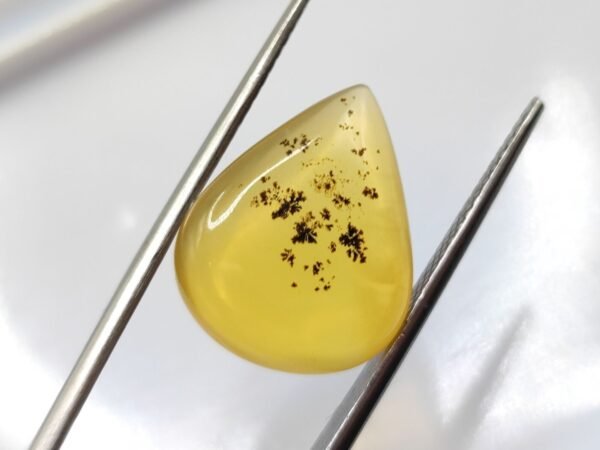 Opale de feu à inclusions de dendrites naturelles - taille poire cabochon - Pierre fine pour bijoux uniques et collection.