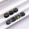 lot de 7 saphirs naturels taille ovale , bleu-vert , en provenance d'australie. Pierres précieuses pour joaillerie et collection