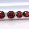 wonderful natural precious garnet gemstone , round and pear cut - blood pigeon color
