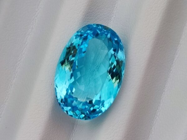 Blue swiss Topaz 22.68 Carats - The Fine Gems - oval cut - blue gemstone