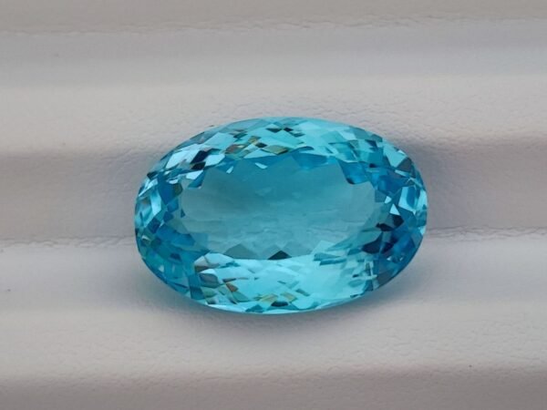 Blue swiss Topaz 22.68 Carats - The Fine Gems - oval cut - blue gemstone