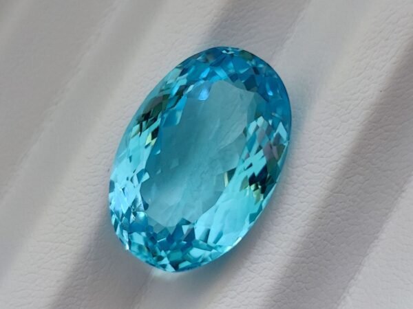 Blue swiss Topaz 22.68 Carats - The Fine Gems - oval cut - blue gemstone