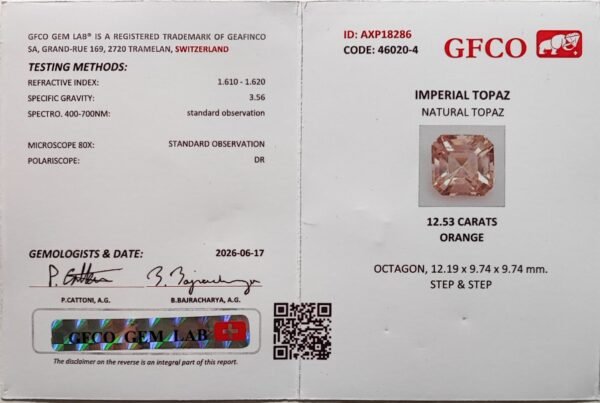 Imperial Topaz 12.53 Carats Certificat Topaze impériale 12.53 Carats taille octogonale aux reflets champagne et pêche
