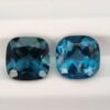 Paire de topazes London Blue certifiées AIG 16.71 carats aux nuances bleu nuit et azur