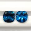 Paire de topazes London Blue certifiées AIG 16.71 carats aux nuances bleu nuit et azur